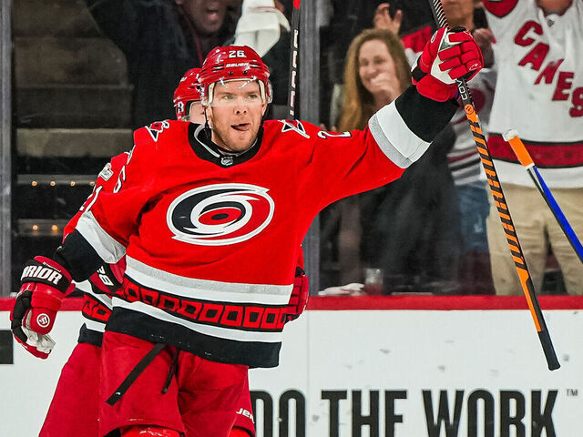 RALEIGH, NORTH CAROLINA - APRIL 25: Paul Stastny #26 of the Carolina Hurricanes celebrates with teammates after scoring a goal during the second period against the New York Islanders in Game Five of the First Round of the 2023 Stanley Cup Playoffs at PNC Arena on April 25, 2023 in Raleigh, North Carolina.