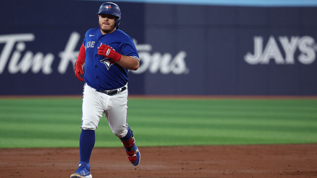TORONTO, ON - APRIL 28 - Toronto Blue Jays catcher Alejandro Kirk (30) hits a home run as the Toronto Blue Jays play the Seattle Mariners at Rogers Centre in Toronto. April 28, 2023. (Steve Russell/Toronto Star via Getty Images)