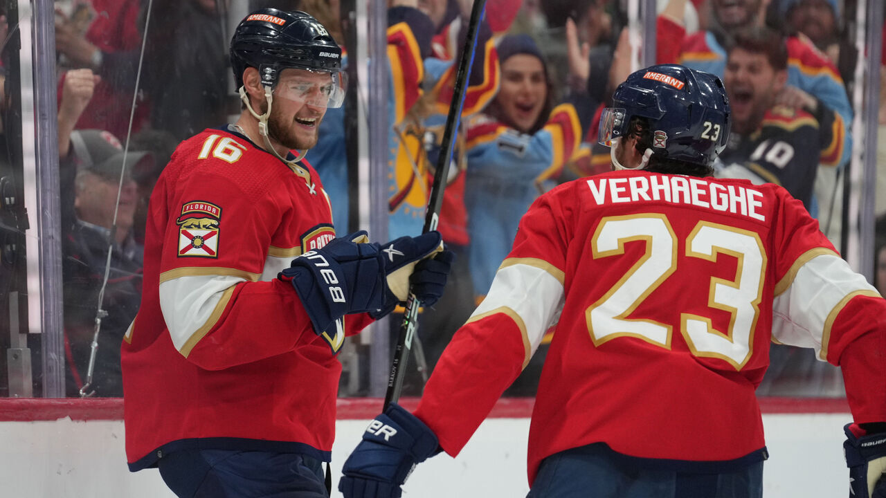 SUNRISE, FL - APRIL 23: Florida Panthers center Aleksander Barkov (16) smiles at Florida Panthers center Carter Verhaeghe (23) after his goal in the second period as the fans celebrate during game six of the first round of the Eastern Conference Playoffs between the Boston Bruins and the Florida Panthers on Friday, April 28, 2023 at FLA Live Arena in Sunrise, Fla