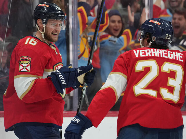 SUNRISE, FL - APRIL 23: Florida Panthers center Aleksander Barkov (16) smiles at Florida Panthers center Carter Verhaeghe (23) after his goal in the second period as the fans celebrate during game six of the first round of the Eastern Conference Playoffs between the Boston Bruins and the Florida Panthers on Friday, April 28, 2023 at FLA Live Arena in Sunrise, Fla