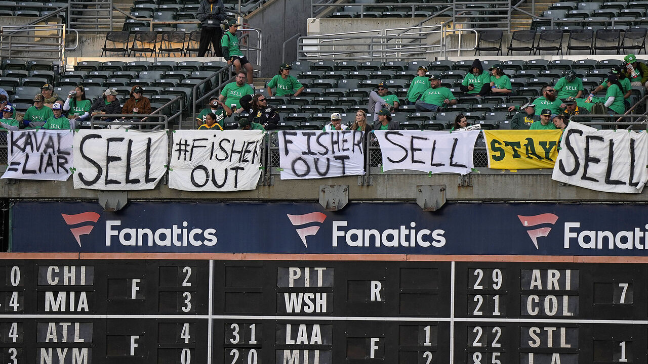 OAKLAND, CALIFORNIA - APRIL 28: With the decision to move from Oakland to Las Vegas fans of the Oakland Athletics hang signs from the right field seats during the game against the Cincinnati Reds at RingCentral Coliseum on April 28, 2023 in Oakland, California.