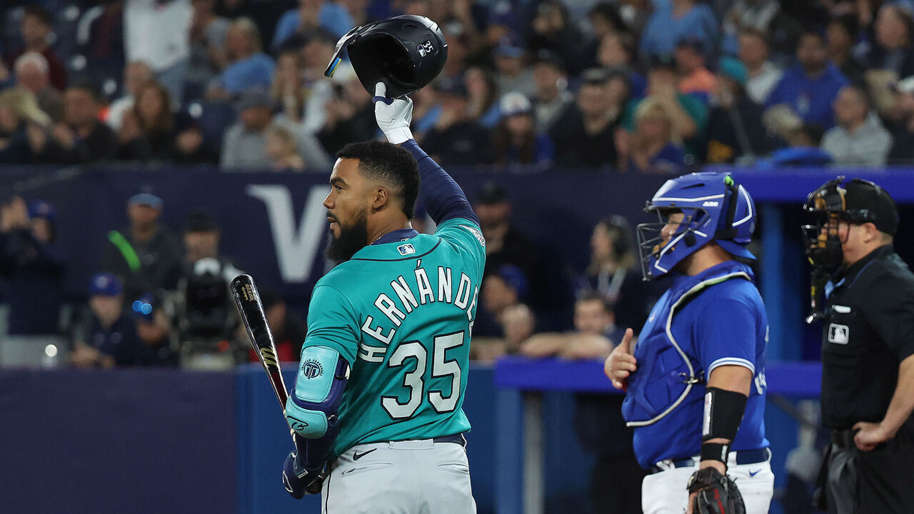 TORONTO, ON - APRIL 28 - Toronto Blue Jays earn a tip of the hat as they welcome back Seattle Mariners right fielder Teoscar Hernandez (35) as the Toronto Blue Jays play the Seattle Mariners at Rogers Centre in Toronto. April 28, 2023. (Steve Russell/Toronto Star via Getty Images)