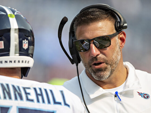 NASHVILLE, TENNESSEE - SEPTEMBER 12: Head Coach Mike Vrabel talks with Ryan Tannehill #17 of the Tennessee Titans during the game against the Arizona Cardinals at Nissan Stadium on September 12, 2021 in Nashville, Tennessee. The Cardinals defeated the Titans 38-13.
