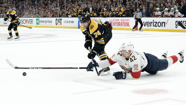 BOSTON, MA - APRIL 26: Florida Panthers defenseman Gustav Forsling (42) defends on Boston Bruins left wing Jake DeBrusk (74) during Game 5 of an Eastern Conference First Round playoff contest between the Boston Bruins and the Florida Panthers on April 26, 2023, at TD Garden in Boston, Massachusetts.