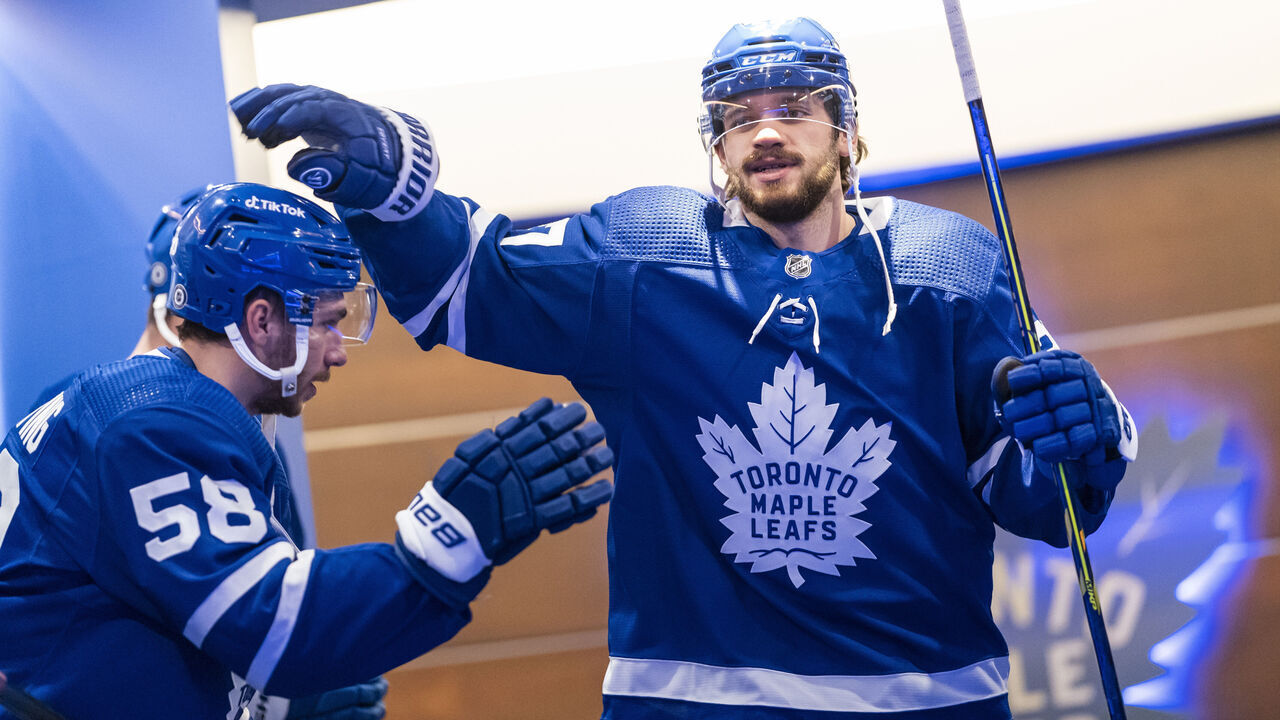 TORONTO, ON - DECEMBER 9: Timothy Liljegren #37 of the Toronto Maple Leafs walks out of the locker room with Michael Bunting #58 before playing the Tampa Bay Lightning at the Scotiabank Arena on December 9, 2021 in Toronto, Ontario, Canada.
