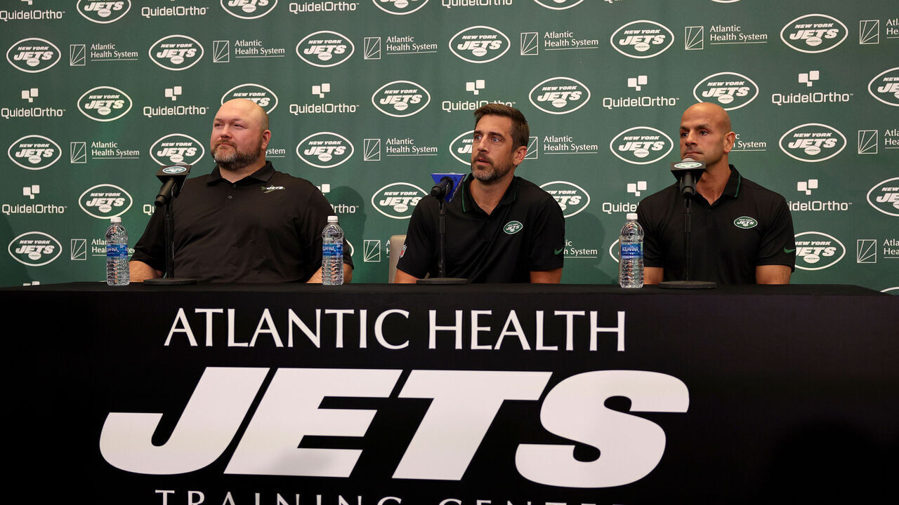FLORHAM PARK, NEW JERSEY - APRIL 26: (L-R) New York Jets general manager Joe Douglas, quarterback Aaron Rodgers and head coach Robert Saleh attend a press conference at Atlantic Health Jets Training Center on April 26, 2023 in Florham Park, New Jersey.