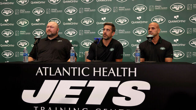 FLORHAM PARK, NEW JERSEY - APRIL 26: (L-R) New York Jets general manager Joe Douglas, quarterback Aaron Rodgers and head coach Robert Saleh attend a press conference at Atlantic Health Jets Training Center on April 26, 2023 in Florham Park, New Jersey.