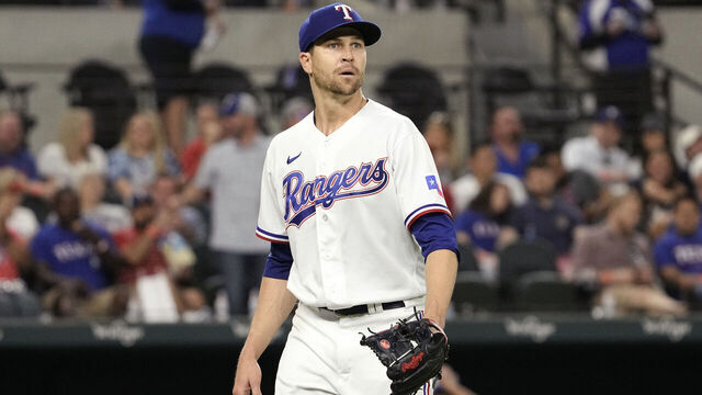 ARLINGTON, TEXAS - APRIL 11: Jacob deGrom #48 of the Texas Rangers looks on during the game against the Kansas City Royals at Globe Life Field on April 11, 2023 in Arlington, Texas.