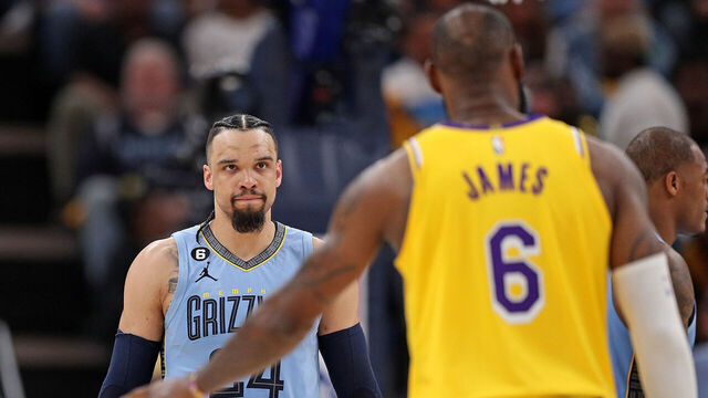 MEMPHIS, TENNESSEE - APRIL 26: Dillon Brooks #24 of the Memphis Grizzlies looks at LeBron James #6 of the Los Angeles Lakers during the second half of Game Five of the Western Conference First Round Playoffs at FedExForum on April 26, 2023 in Memphis, Tennessee.