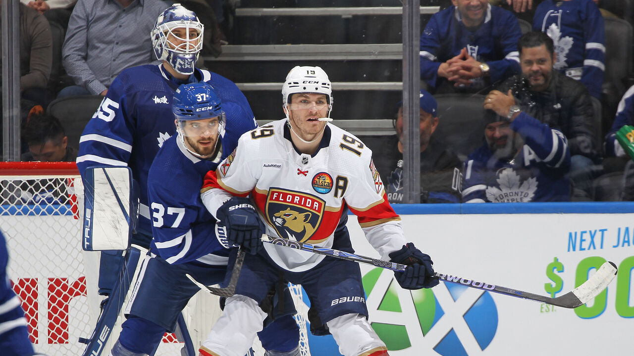 TORONTO, CANADA - JANUARY 17: Timothy Liljegren #37 of the Toronto Maple Leafs tries to contain Matthew Tkachuk #19 of the Florida Panthers during an NHL game at Scotiabank Arena on January 17, 2023 in Toronto, Ontario, Canada.