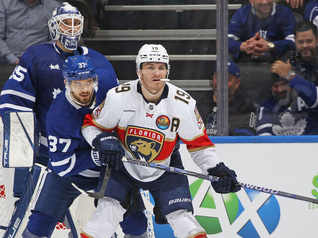 TORONTO, CANADA - JANUARY 17: Timothy Liljegren #37 of the Toronto Maple Leafs tries to contain Matthew Tkachuk #19 of the Florida Panthers during an NHL game at Scotiabank Arena on January 17, 2023 in Toronto, Ontario, Canada.