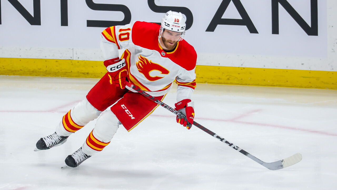 WINNIPEG, CANADA - APRIL 05: Jonathan Huberdeau #10 of the Calgary Flames skates during second period action against the Winnipeg Jets at Canada Life Centre on April 05, 2023 in Winnipeg, Manitoba, Canada.