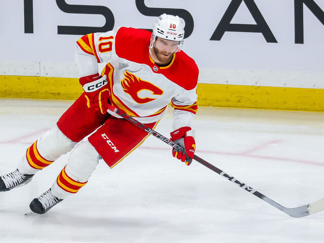 WINNIPEG, CANADA - APRIL 05: Jonathan Huberdeau #10 of the Calgary Flames skates during second period action against the Winnipeg Jets at Canada Life Centre on April 05, 2023 in Winnipeg, Manitoba, Canada.
