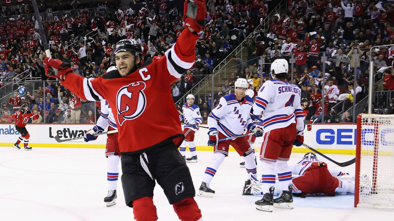 NEWARK, NEW JERSEY - MAY 01: Nico Hischier #13 of the New Jersey Devils celebrates a second period goal by Tomas Tatar #90 against Igor Shesterkin #31 of the New York Rangers in Game Seven of the First Round of the 2023 Stanley Cup Playoffs at Prudential Center on May 01, 2023 in Newark, New Jersey.