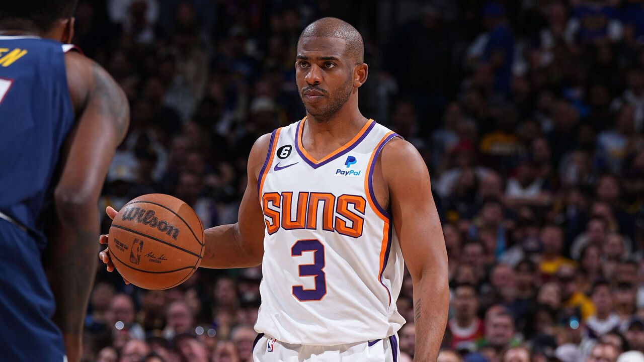 DENVER, CO - MAY 1: Chris Paul #3 of the Phoenix Suns dribbles the ball during Game Two of the Western Conference Semi-Finals of the 2023 NBA Playoffs against the Denver Nuggets on May 1, 2023 at the Ball Arena in Denver, Colorado. NOTE TO USER: User expressly acknowledges and agrees that, by downloading and/or using this Photograph, user is consenting to the terms and conditions of the Getty Images License Agreement. Mandatory Copyright Notice: Copyright 2023 NBAE