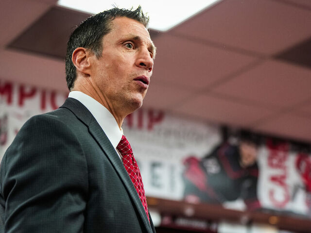 RALEIGH, NORTH CAROLINA - APRIL 17: Head coach Rod Brind'Amour of the Carolina Hurricanes addresses the team in the locker room after the 2-1 victory over the New York Islanders in Game One of the First Round of the 2023 Stanley Cup Playoffs at PNC Arena on April 17, 2023 in Raleigh, North Carolina.