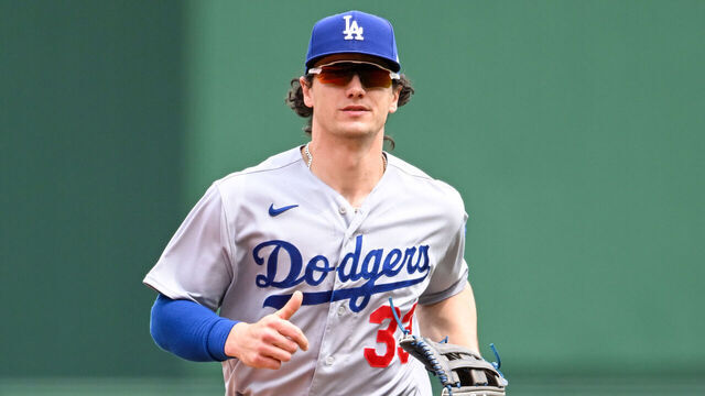 PITTSBURGH, PENNSYLVANIA - APRIL 27, 2023: James Outman #33 of the Los Angeles Dodgers runs off the field after the eighth inning against the Pittsburgh Pirates at PNC Park on April 27, 2023 in Pittsburgh, Pennsylvania.