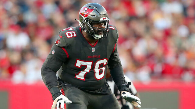 TAMPA, FL - DECEMBER 18: Tampa Bay Buccaneers offensive lineman Donovan Smith (76) pass blocks during the regular season game between the Cincinnati Bengals and the Tampa Bay Buccaneers on December 18, 2022 at Raymond James Stadium in Tampa, Florida.