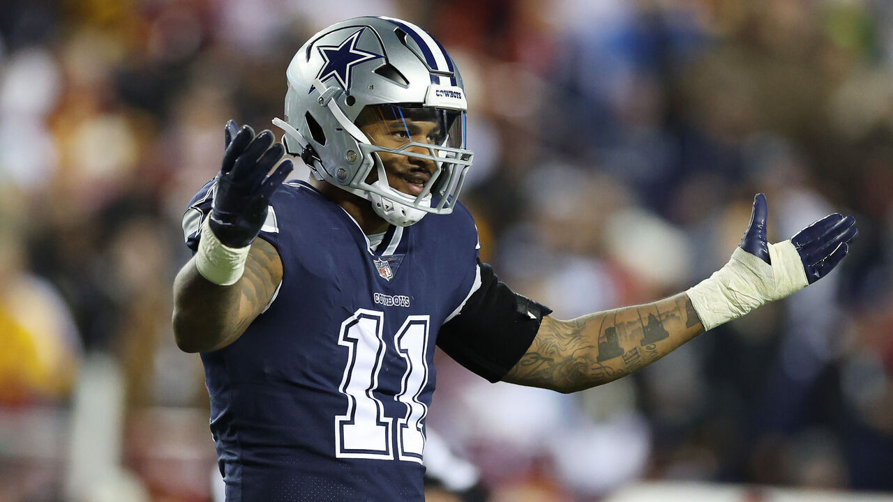 LANDOVER, MARYLAND - JANUARY 08: Micah Parsons #11 of the Dallas Cowboys looks on during the second half of the game against the Washington Commanders at FedExField on January 08, 2023 in Landover, Maryland.