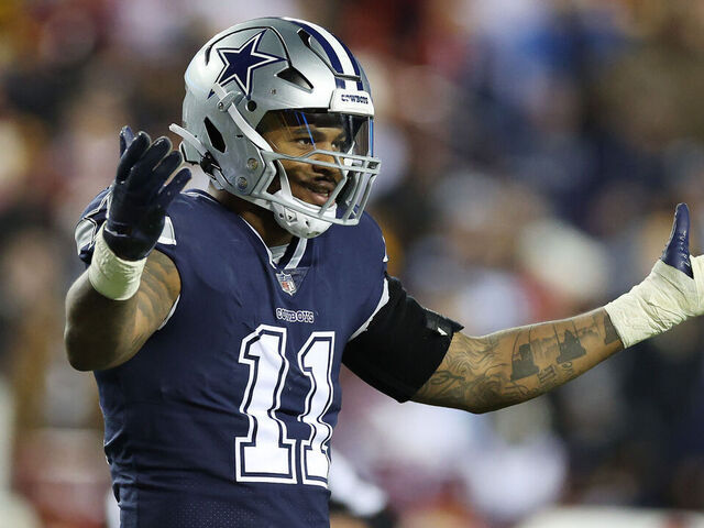 LANDOVER, MARYLAND - JANUARY 08: Micah Parsons #11 of the Dallas Cowboys looks on during the second half of the game against the Washington Commanders at FedExField on January 08, 2023 in Landover, Maryland.