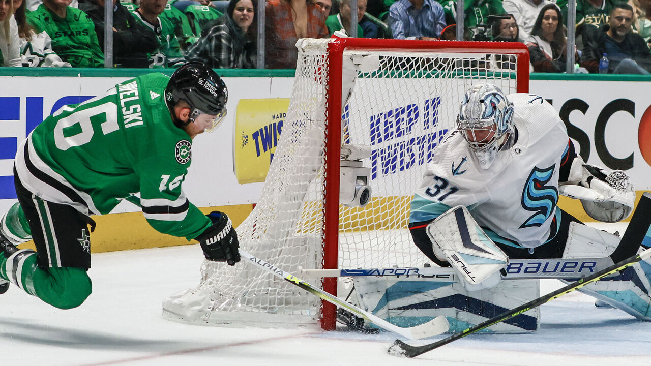 DALLAS, TX - MAY 02: Dallas Stars center Joe Pavelski (16) tries to poke the puck past Seattle Kraken goaltender Philipp Grubauer (31) during the game between the Dallas Stars and the Seattle Kraken on May 2, 2023 at American Airlines Center in Dallas, Texas.