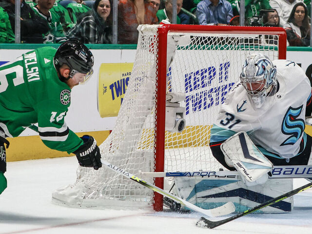 DALLAS, TX - MAY 02: Dallas Stars center Joe Pavelski (16) tries to poke the puck past Seattle Kraken goaltender Philipp Grubauer (31) during the game between the Dallas Stars and the Seattle Kraken on May 2, 2023 at American Airlines Center in Dallas, Texas.