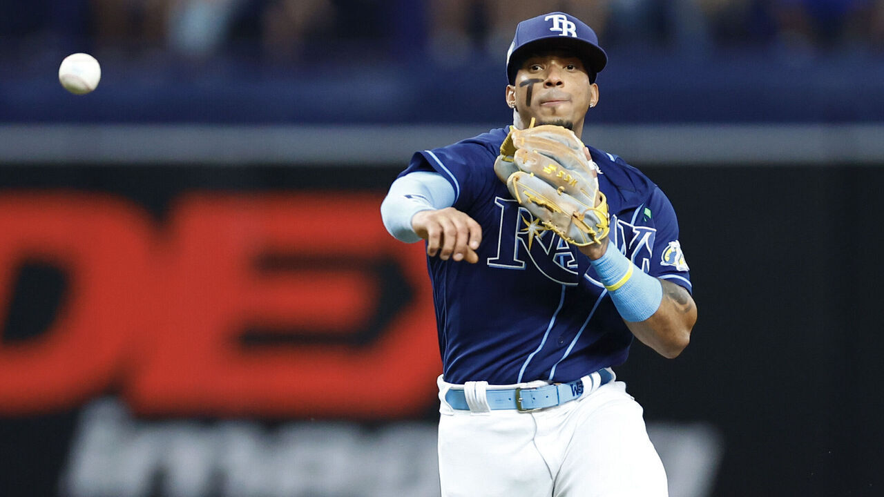 ST PETERSBURG, FLORIDA - MAY 03: Wander Franco #5 of the Tampa Bay Rays fields a ball from Miguel Andujar #26 of the Pittsburgh Pirates during the fourth inning at Tropicana Field on May 03, 2023 in St Petersburg, Florida.