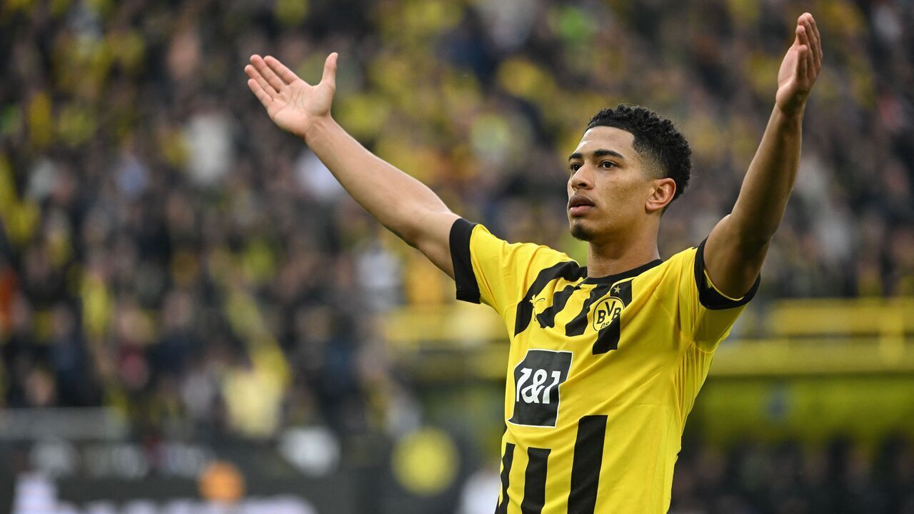 Dortmund's English midfielder Jude Bellingham celebrates scoring his team's first goal during the German first division Bundesliga football match between BVB Borussia Dortmund and Eintracht Frankfurt in Dortmund, western Germany, on April 22, 2023.