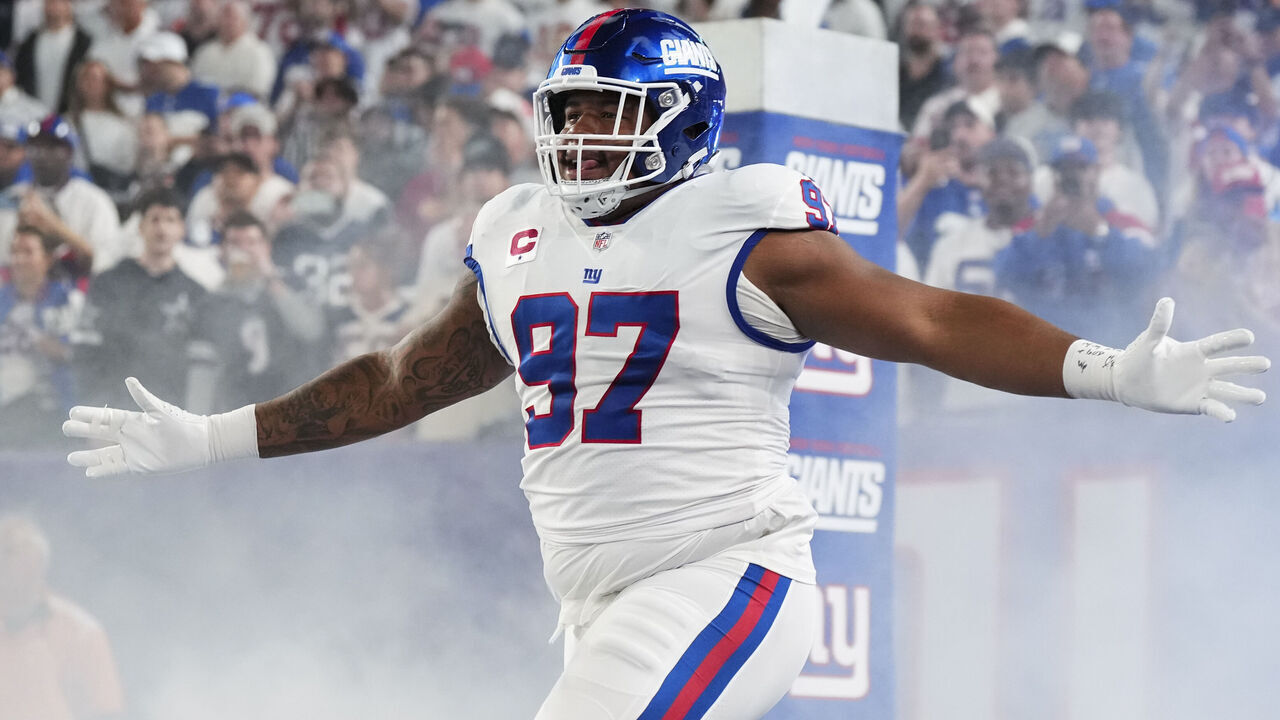 EAST RUTHERFORD, NJ - SEPTEMBER 26: Dexter Lawrence #97 of the New York Giants runs out during introductions against the Dallas Cowboys at MetLife Stadium on September 26, 2022 in East Rutherford, New Jersey.