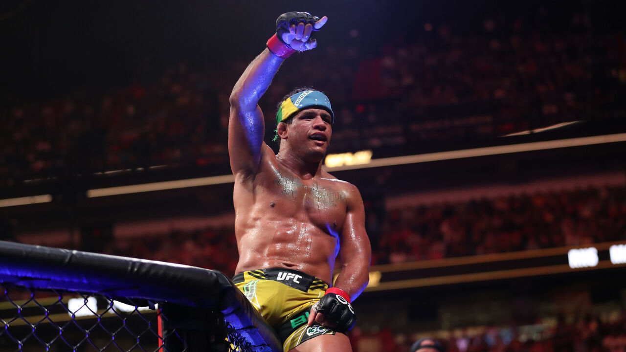 MIAMI, FLORIDA - APRIL 8: Gilbert Burns celebrates his victory over Jorge Masvidal in their welterweight fight during the UFC 287 event on April 8, 2023, at the Kaseya Center in Miami, FL.
