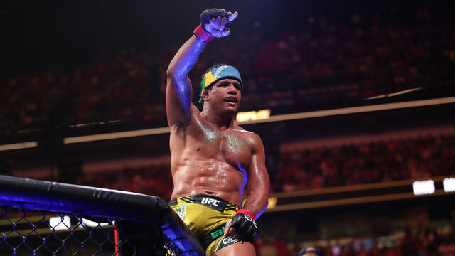 MIAMI, FLORIDA - APRIL 8: Gilbert Burns celebrates his victory over Jorge Masvidal in their welterweight fight during the UFC 287 event on April 8, 2023, at the Kaseya Center in Miami, FL.