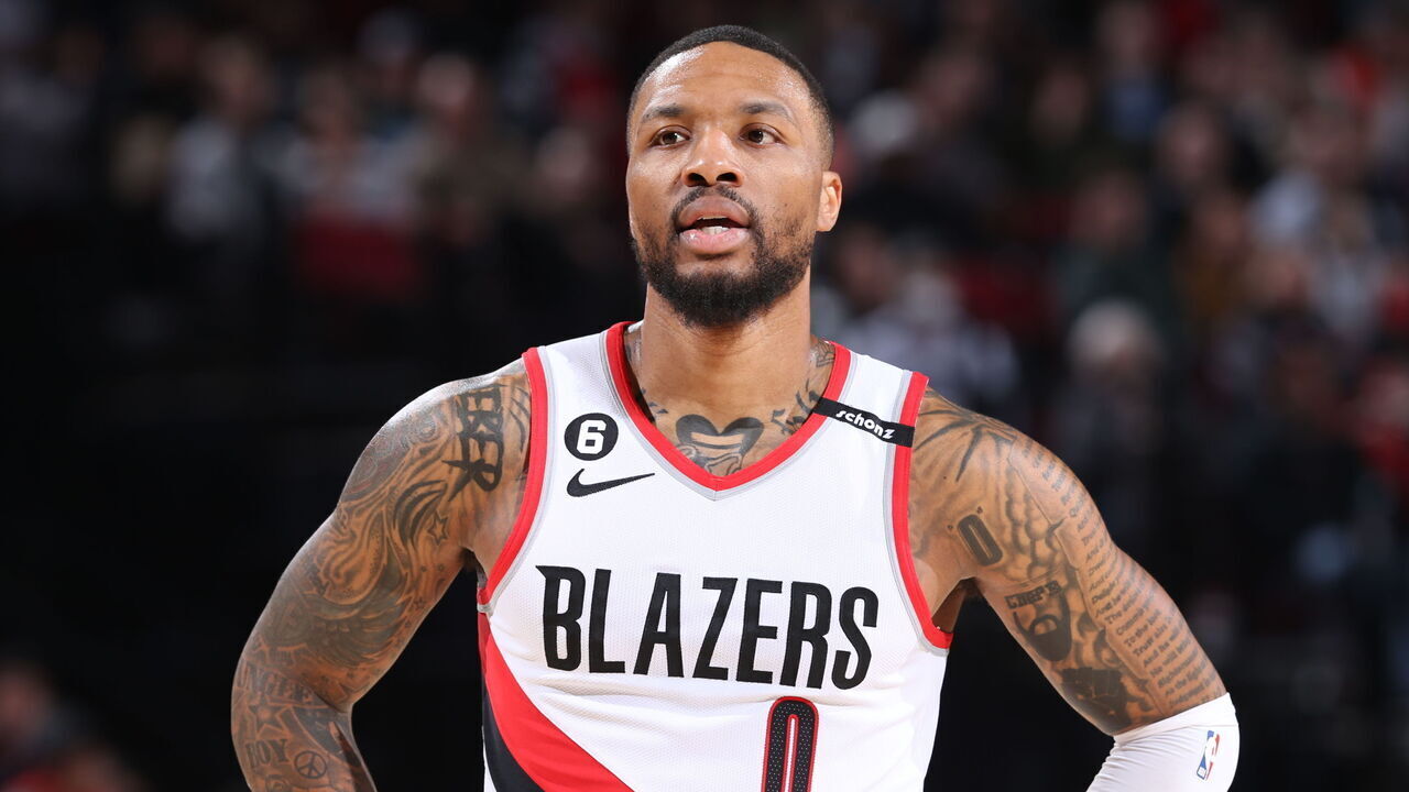 PORTLAND, OR - MARCH 19: Damian Lillard #0 of the Portland Trail Blazers looks on during the game on March 19, 2023 at the Moda Center Arena in Portland, Oregon. Mandatory Copyright Notice: Copyright 2023 NBAE