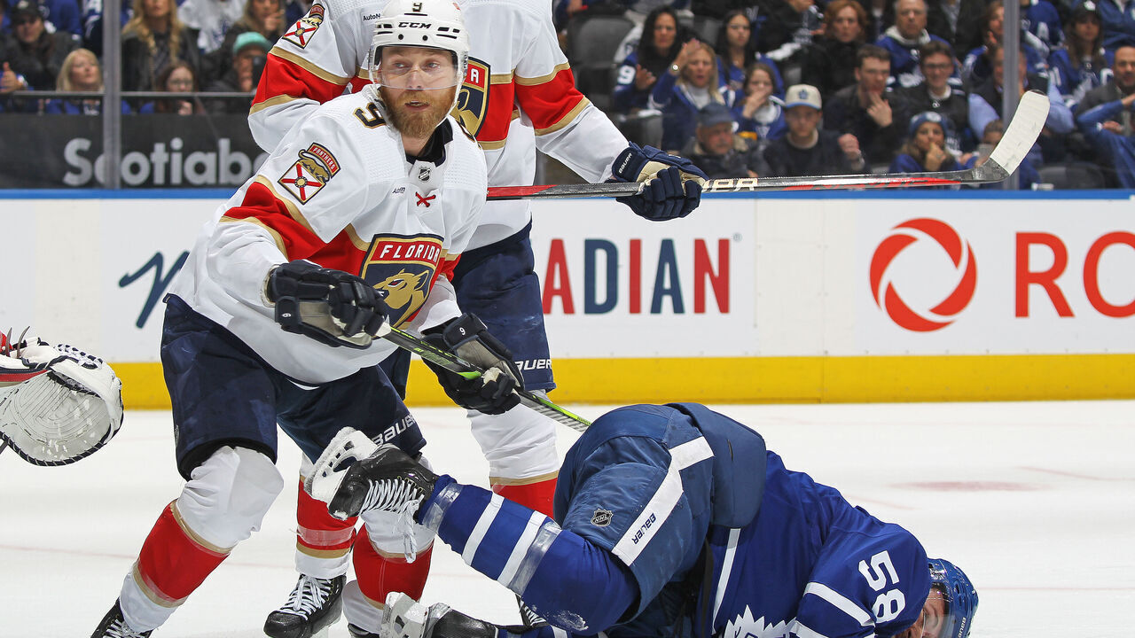 TORONTO, CANADA- MAY4: Sam Bennett #9 of the Florida Panthers takes a cross checking penalty against Michael Bunting #58 of the Toronto Maple Leafs during Game Two of the Second Round of the 2023 Stanley Cup Playoffs at Scotiabank Arena on May 4, 2023 in Toronto, Ontario, Canada. The Panthers defeated the Maple Leafs 3-2.