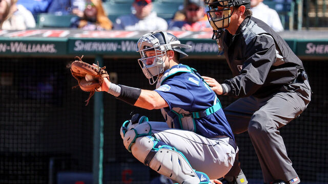 CLEVELAND, OH - APRIL 09: Seattle Mariners catcher Cal Raleigh (29) and home plate umpire DJ Reyburn (17) during the fifth inning of the Major League Baseball game between the Seattle Mariners and Cleveland Guardians on April 9, 2023, at Progressive Field in Cleveland, OH.