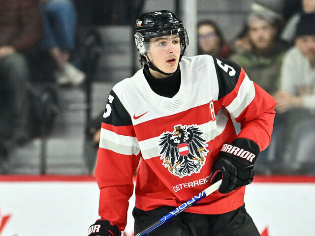 HALIFAX, CANADA - DECEMBER 30: David Reinbacher #5 of Team Austria skates against Team Germany during the first period in the 2023 IIHF World Junior Championship at Scotiabank Centre on December 30, 2022 in Halifax, Nova Scotia, Canada. Team Germany defeated Team Austria 4-2.