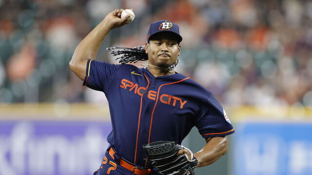 HOUSTON, TEXAS - MAY 01: Luis Garcia #77 of the Houston Astros delivers during the first inning against the San Francisco Giants at Minute Maid Park on May 01, 2023 in Houston, Texas.