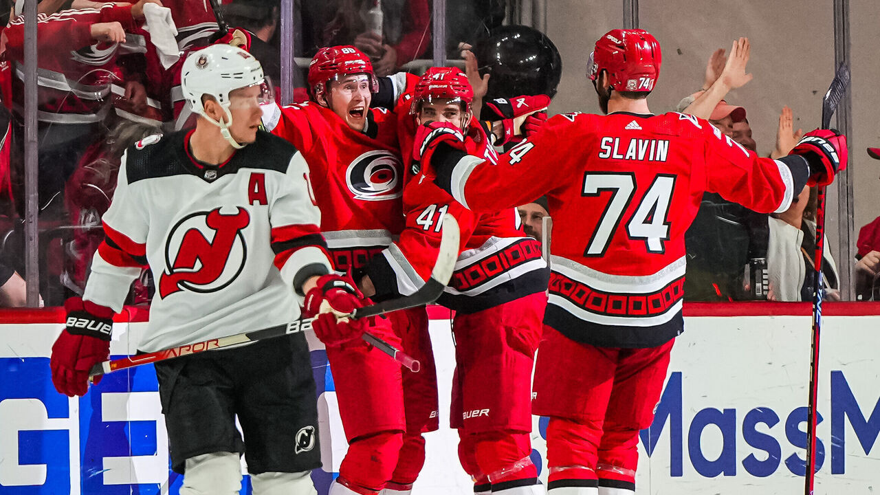 RALEIGH, NORTH CAROLINA - MAY 05: Martin Necas #88 of the Carolina Hurricanes celebrates with teammates after a goal during the second period against the New Jersey Devils in Game Two of the Second Round of the 2023 Stanley Cup Playoffs at PNC Arena on May 05, 2023 in Raleigh, North Carolina.