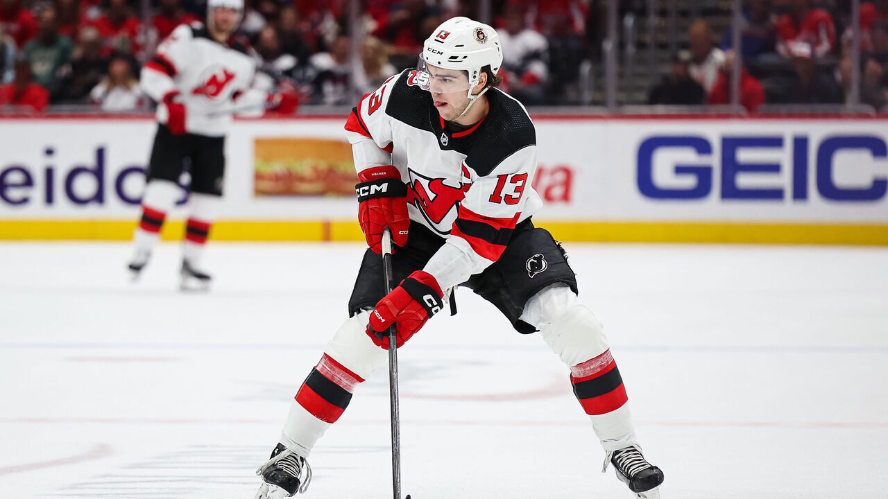 WASHINGTON, DC - APRIL 13: Nico Hischier #13 of the New Jersey Devils skates with the puck against the Washington Capitals during the first period of the game at Capital One Arena on April 13, 2023 in Washington, DC.