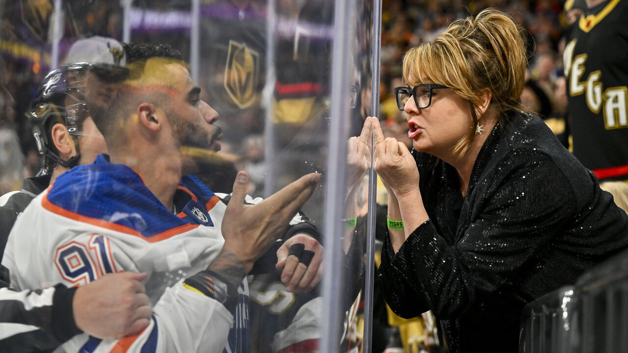 LAS VEGAS, NEVADA - MAY 06: (EDITORS NOTE: This image contains profanity) A Vegas Golden Knights fan interacts with Evander Kane #91 of the Edmonton Oilers after a fight during the second period in Game Two of the Second Round of the 2023 Stanley Cup Playoffs at T-Mobile Arena on May 06, 2023 in Las Vegas, Nevada.