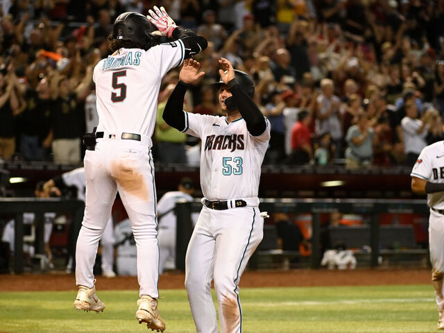 Corbin Carroll of the Arizona Diamondbacks follows through on a swing  News Photo - Getty Images