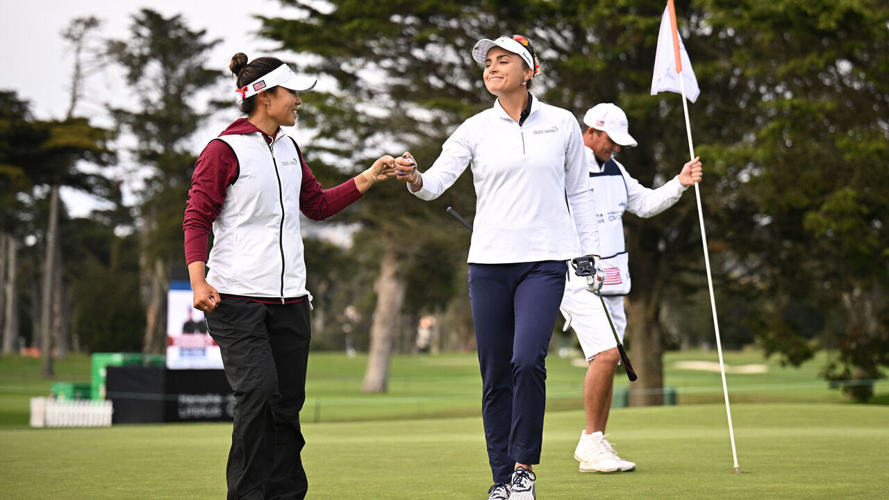 SAN FRANCISCO, CALIFORNIA - MAY 6: Danielle Kang (L) and Lexi Thompson (R) of Team United States fist bump after a putt on the 16th green during day three of the Hanwha LIFEPLUS International Crown at TPC Harding Park on May 6, 2023 in San Francisco, California.