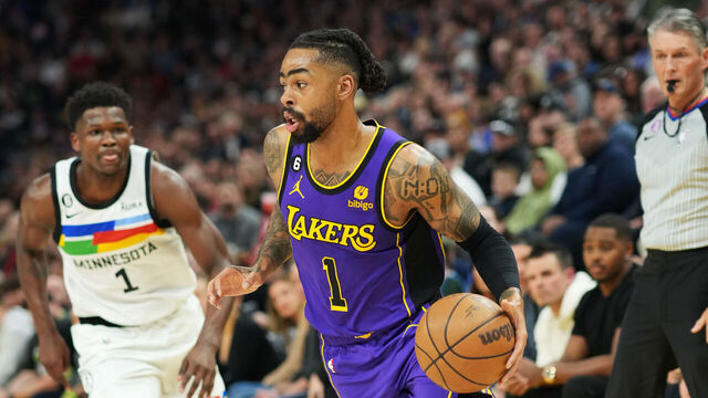MINNEAPOLIS, MN - MARCH 31: D'Angelo Russell #1 of the Los Angeles Lakers drives to the basket during the game against the Minnesota Timberwolves on March 31, 2023 at Target Center in Minneapolis, Minnesota. Mandatory Copyright Notice: Copyright 2023 NBAE