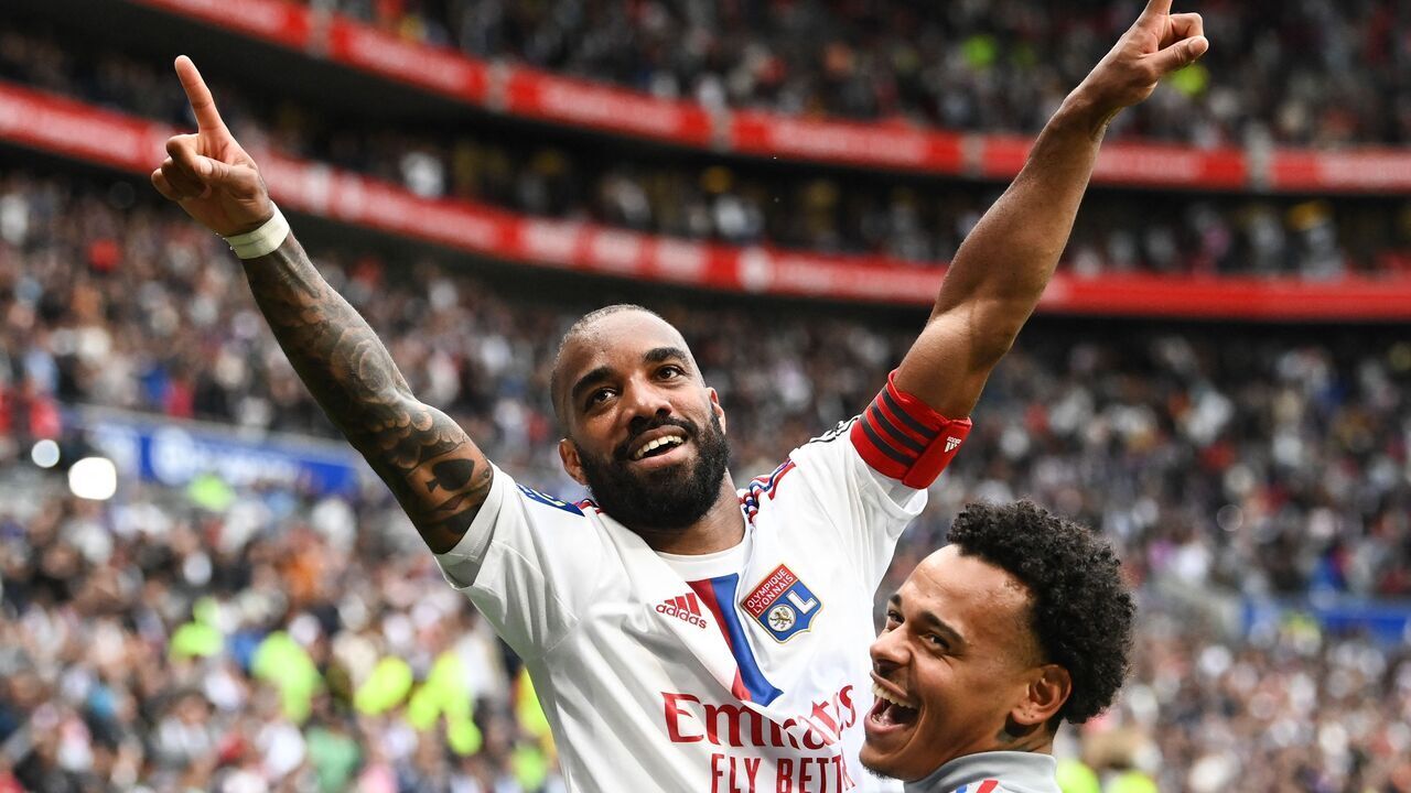 Lyon's French forward Alexandre Lacazette celebrates scoring his team's fifth goal during the French L1 football match between Olympique Lyonnais (OL) and Montpellier Herault SC at The Groupama Stadium in Decines-Charpieu, central-eastern France on May 7, 2023.