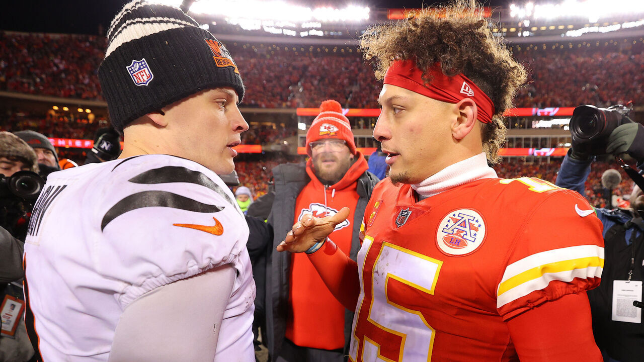 KANSAS CITY, MISSOURI - JANUARY 29: Joe Burrow #9 of the Cincinnati Bengals and Patrick Mahomes #15 of the Kansas City Chiefs meet on the field after the AFC Championship Game at GEHA Field at Arrowhead Stadium on January 29, 2023 in Kansas City, Missouri.