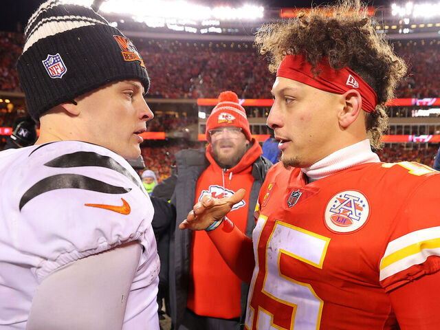 KANSAS CITY, MISSOURI - JANUARY 29: Joe Burrow #9 of the Cincinnati Bengals and Patrick Mahomes #15 of the Kansas City Chiefs meet on the field after the AFC Championship Game at GEHA Field at Arrowhead Stadium on January 29, 2023 in Kansas City, Missouri.