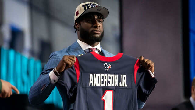 KANSAS CITY, MO - APRIL 27: Will Anderson Jr. dons a jersey after being selected to the Houston Texans during Round One of the 2023 NFL Draft on Thursday April 27, 2023 at Union Station in Kansas City, MO.