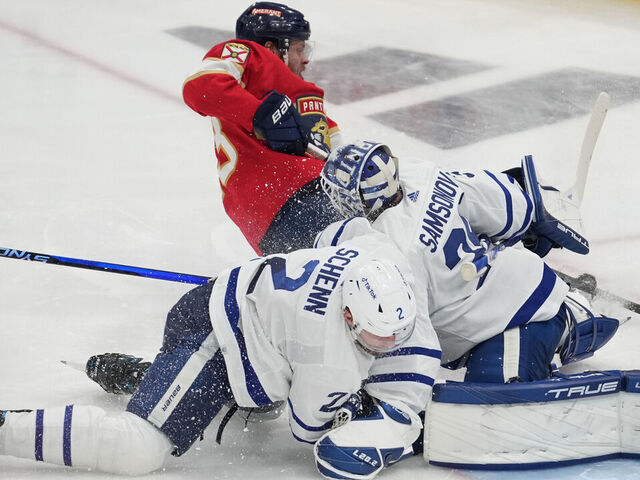 SUNRISE, FL - MAY 07: Toronto Maple Leafs defenseman Luke Schenn (2) slides hard into Toronto Maple Leafs goaltender Ilya Samsonov (35) knocking him out of the game as they try to defends against Florida Panthers center Sam Reinhart (13) in the second period during game three of the Eastern Conference Second Round Playoff game between the Toronto Maple Leafs and the Florida Panthers on Sunday, May 7, 2023 at FLA Live Area, Sunrise, Fla.
