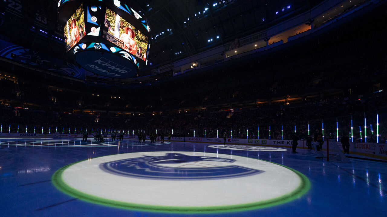 VANCOUVER, CANADA - JANUARY 21: The Vancouver Canucks logo is projected onto the ice prior to the start of NHL action between the Vancouver Canucks and the Edmonton Oilers on January, 21, 2023 at Rogers Arena in Vancouver, British Columbia, Canada.