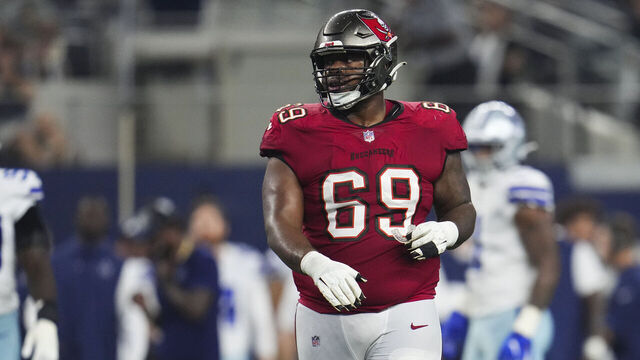 ARLINGTON, TX - SEPTEMBER 11: Shaq Mason #69 of the Tampa Bay Buccaneers walks onto the field against the Dallas Cowboys at AT&T Stadium on September 11, 2022 in Arlington, TX.