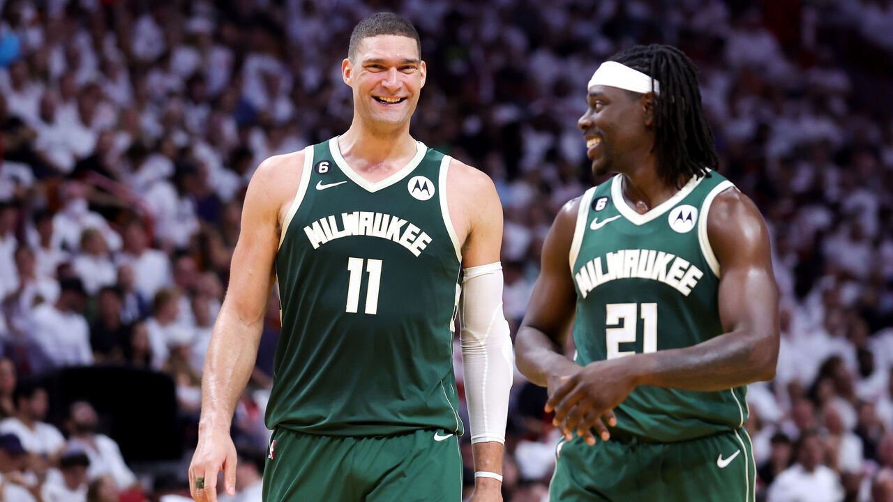 MIAMI, FLORIDA - APRIL 24: Brook Lopez #11 and Jrue Holiday #21 of the Milwaukee Bucks react during the second quarter against the Miami Heat in Game Four of the Eastern Conference First Round Playoffs at Kaseya Center on April 24, 2023 in Miami, Florida.